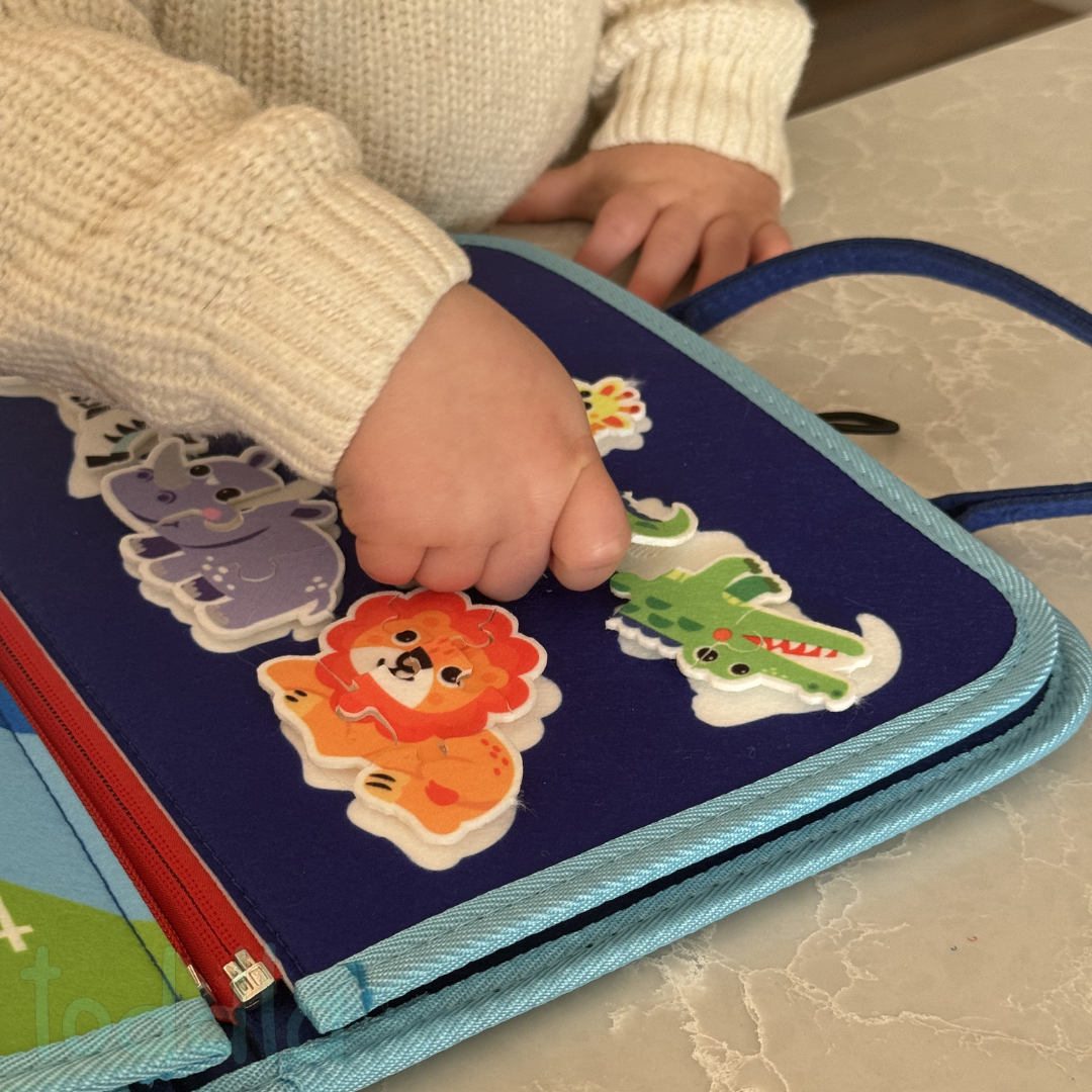Toddla™ Montessori Busy Board for Toddlers – Portable Sensory Activity Board for Fine Motor Skills & Early Learning